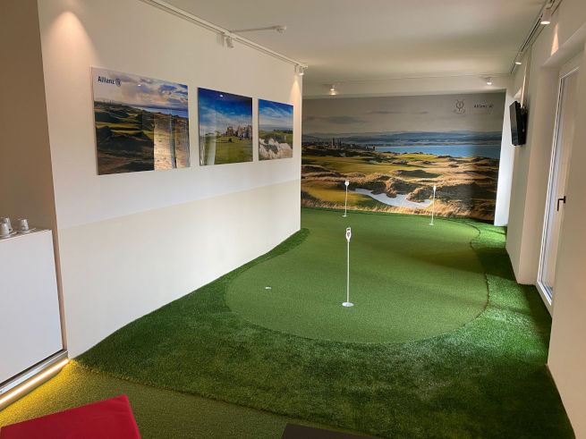 Augusta indoor putting green in an office with scenic wall art